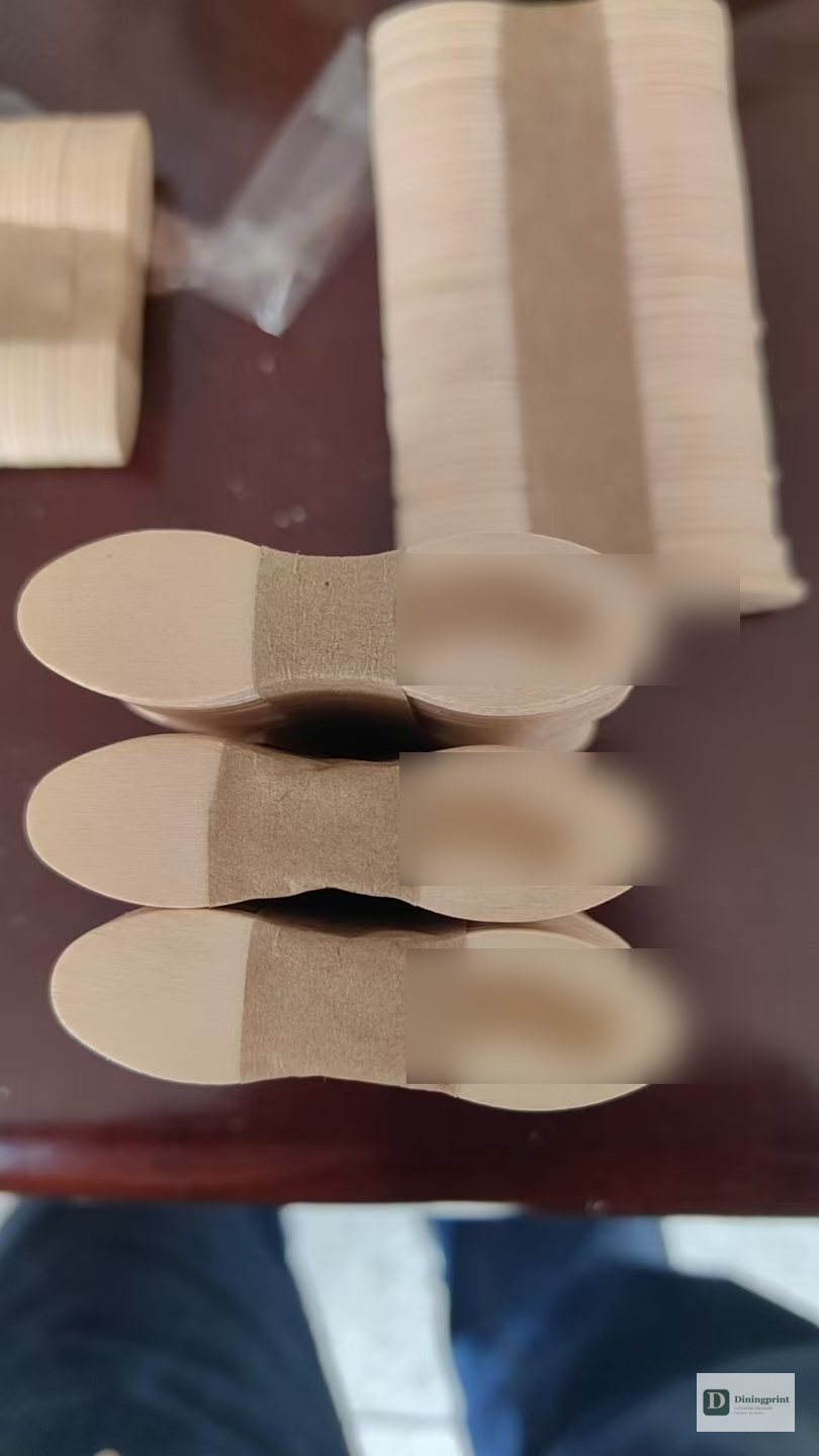 Branded wooden ice cream spoons stacked in a finished carton ready for export shipment