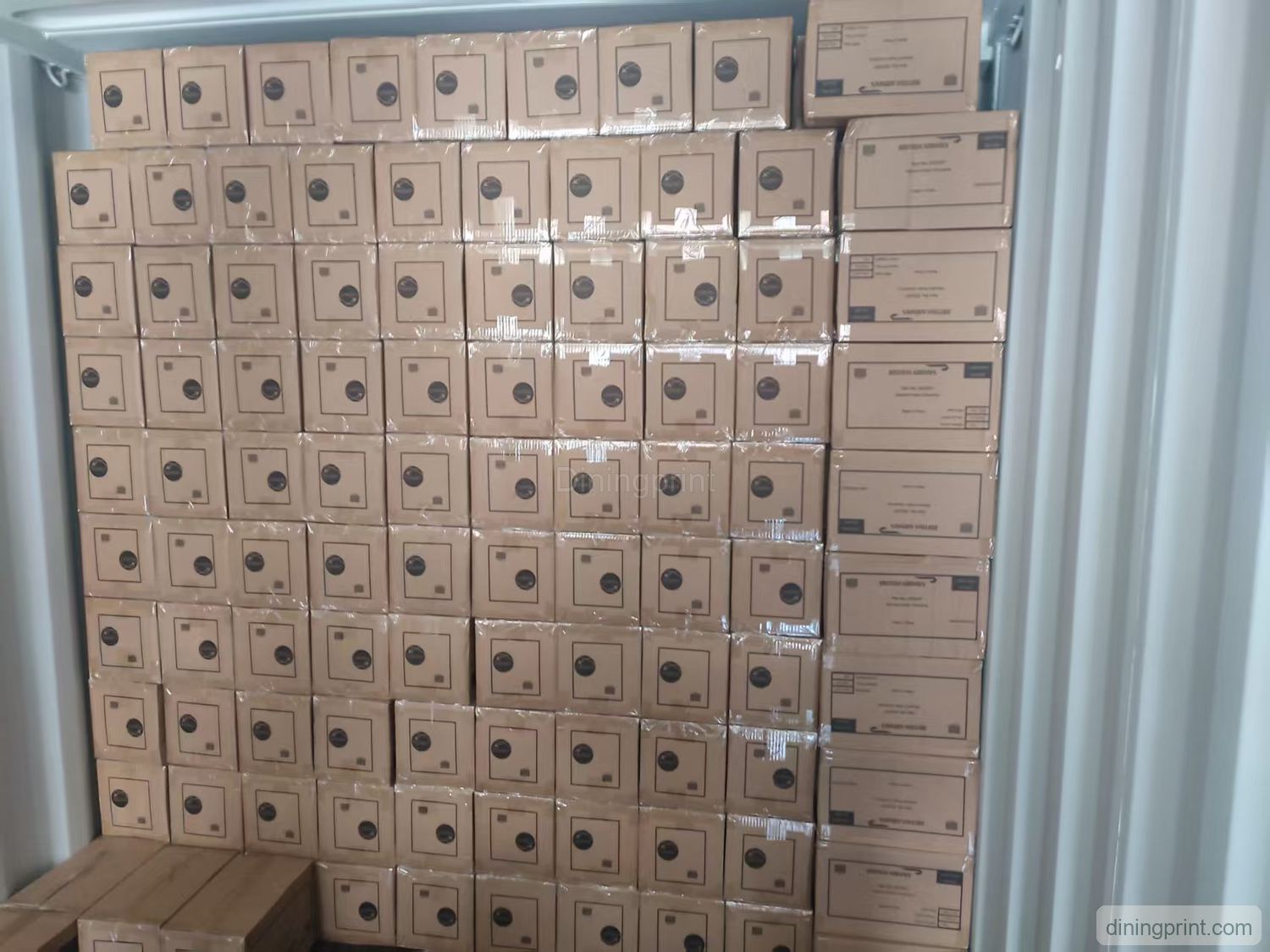 Disposable tableware cartons packed tightly inside a shipping container